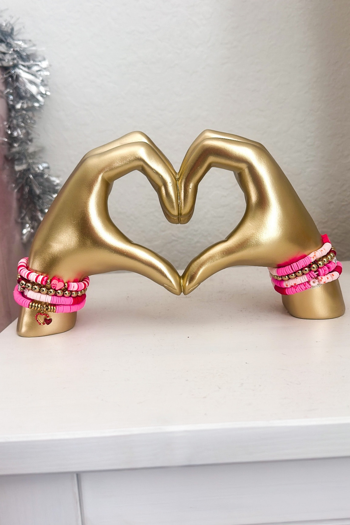 Heart hands art sculpture with friendship bracelets. Perfect Valentine’s Day decor. Taylor swift inspired | concert | jewelry 

#LTKfindsunder50 #LTKhome #LTKSeasonal