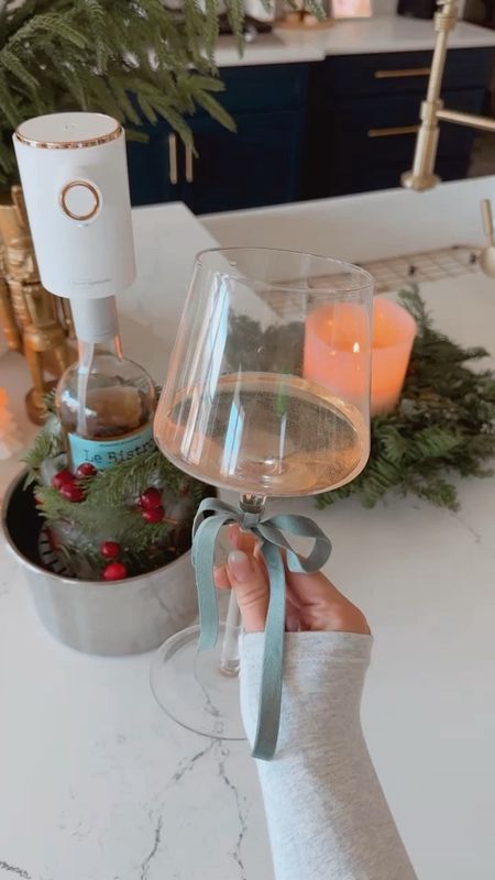 elevate your Christmas party 💫 | sharing a few ways to make your drink area extra special this holiday season

+add bows to glassware 
+make a festive wine chiller
+add a self pour wine aerator 
+add twinkle lights 

-save + share with your hostess friends
-shop in my @amazon storefront, link in bio! 
#christmasparty #christmasideas #partyideas #winebar #hostingtips #christmas #christmastime #tistheseason #amazonfinds #amazonhome

#LTKHoliday #LTKparties #LTKhome