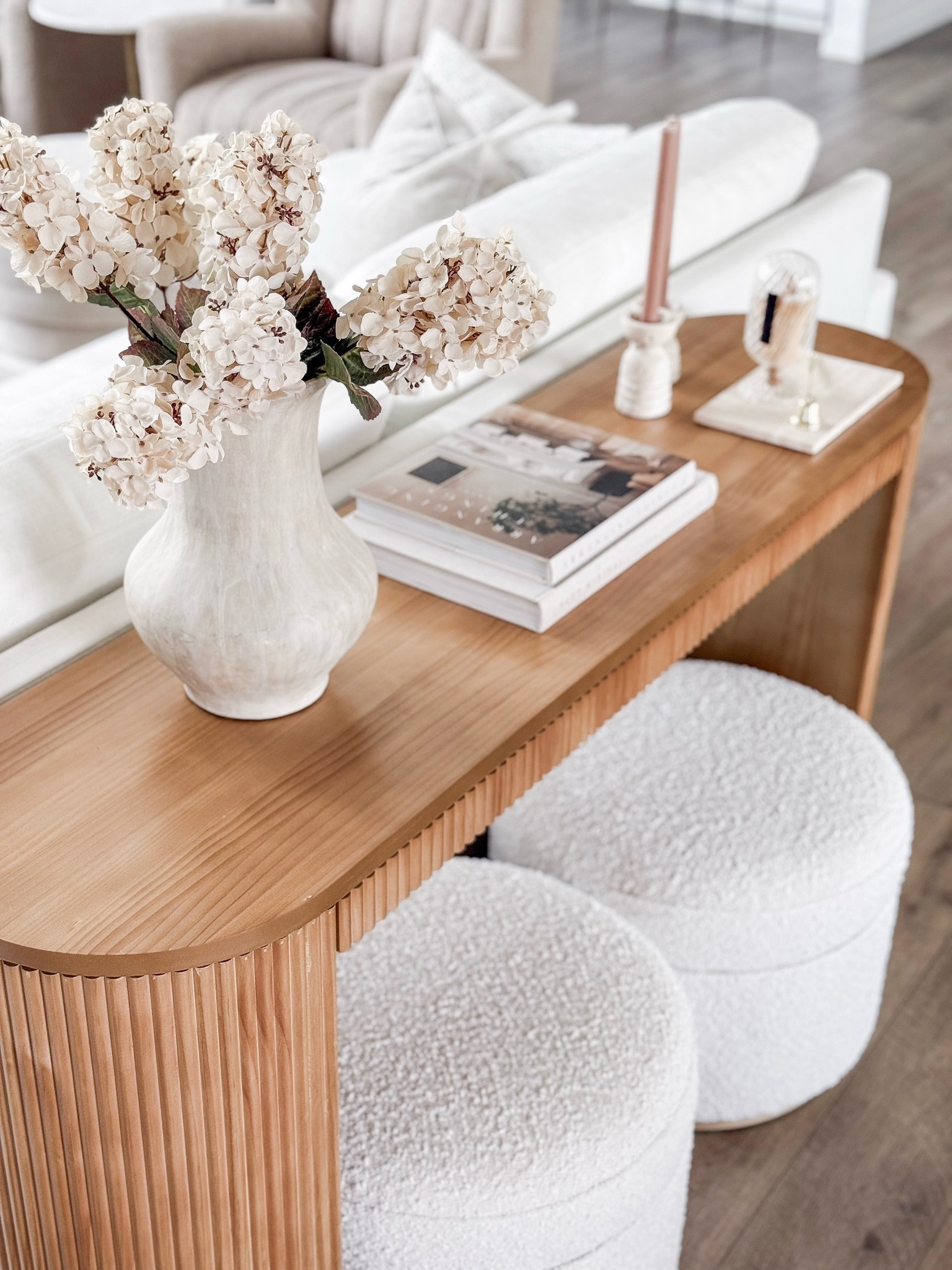 Simple console table styling for spring featuring my favorite storage ottomans!

#LTKSeasonal #LTKHome