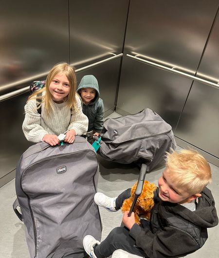 Travel car seats and rolling car seat bags that make traveling with 4 kids and 4 car seats easier - we’re able to stack 2 in eat of these rolling bags!

#LTKtravel #LTKkids #LTKfamily