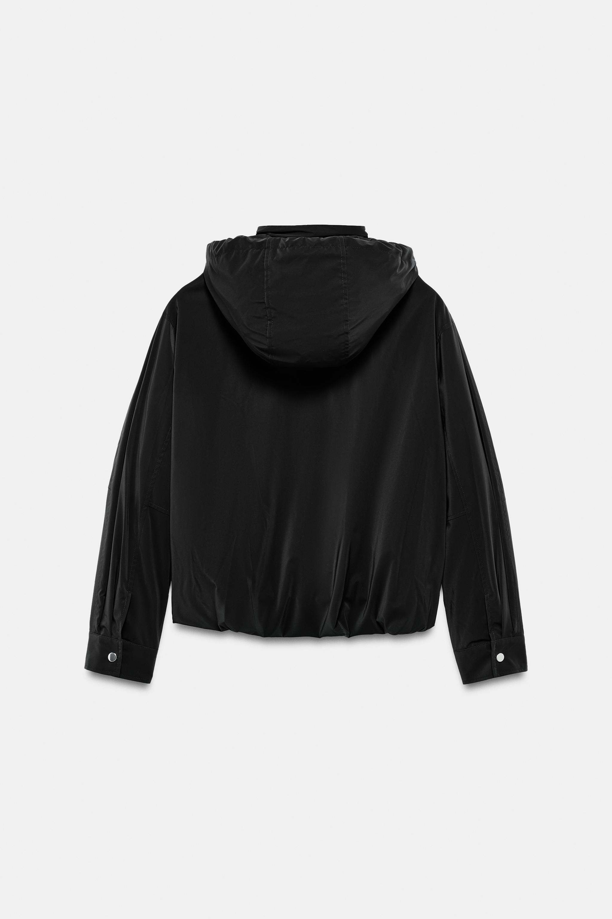 Jacket with a high collar and a hood with adjustable elastic drawstrings. Long sleeves. Front wel... | Zara UK