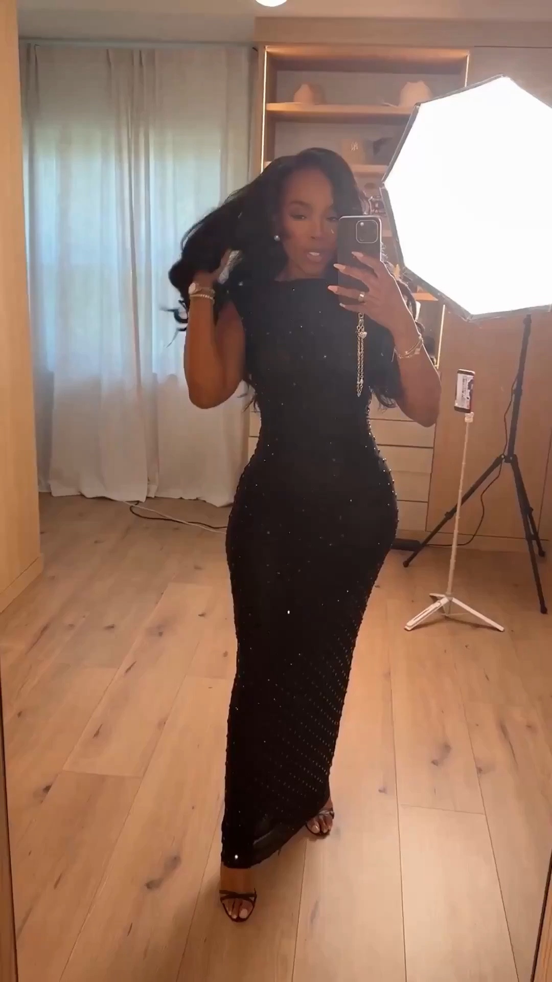 Scroll to shop!
A sleek black sparkle maxi made for a formal night out.



