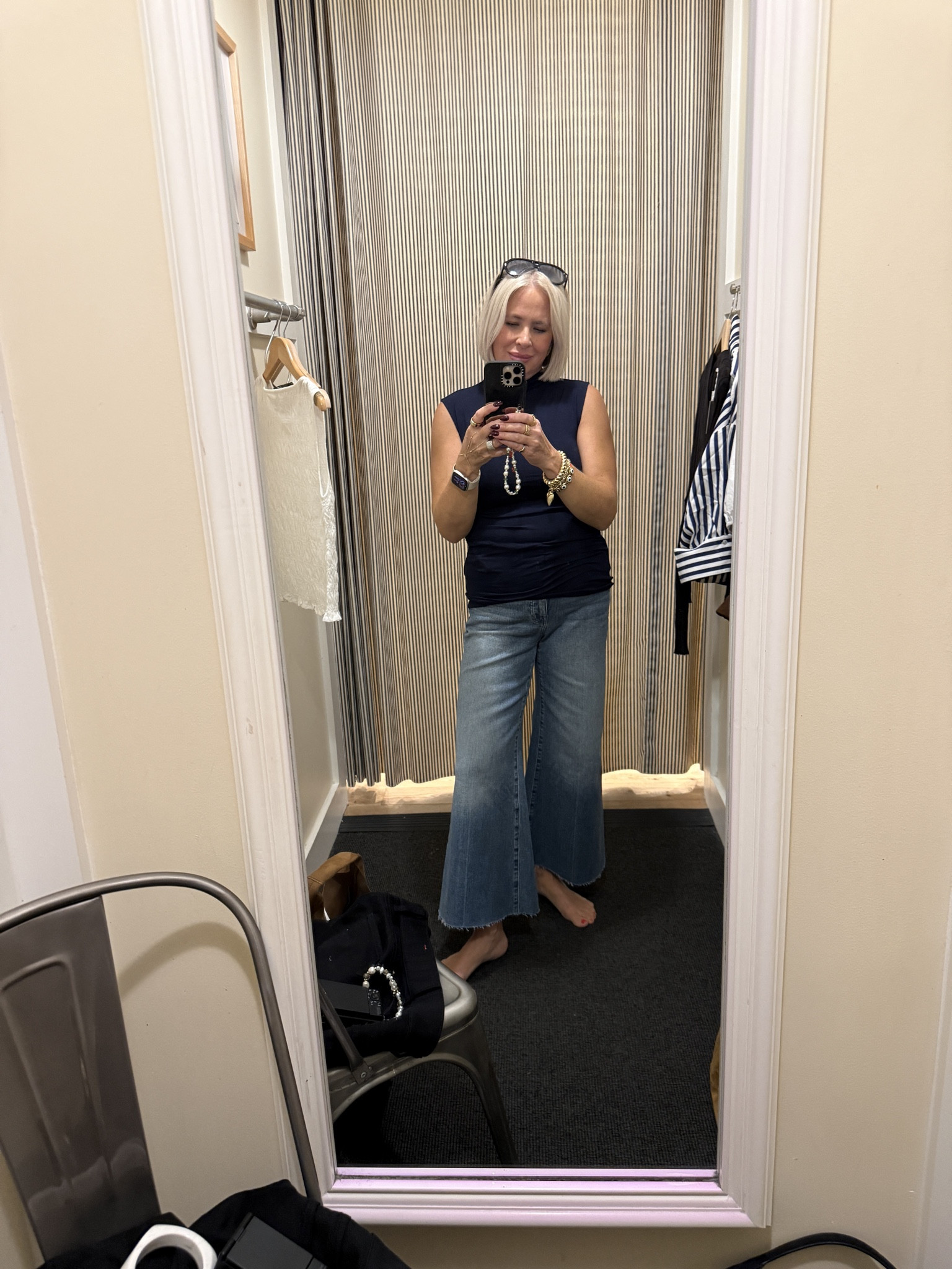 Mock neck sleeveless top in Navy blue. Cropped denim at Madewell all 30% off 

#LTKSeasonal #LTKMidsize #LTKFallSale