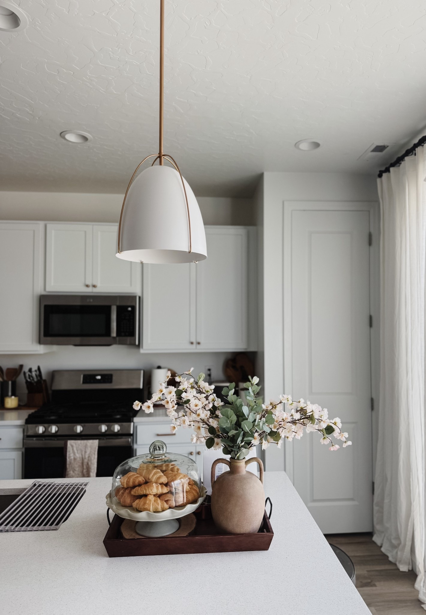 Introducing our kitchen: thoughtfully designed with the addition of pendants that bring warmth, balance, and character to the space.

#LTKStyleTip #LTKHome #LTKFindsUnder50