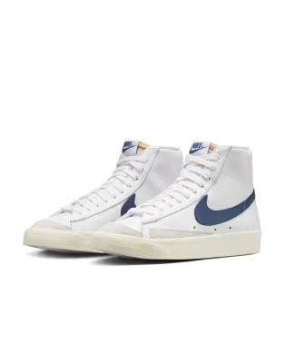 Nike Blazer Mid '77 sneakers in white with blue detail | ASOS (Global)