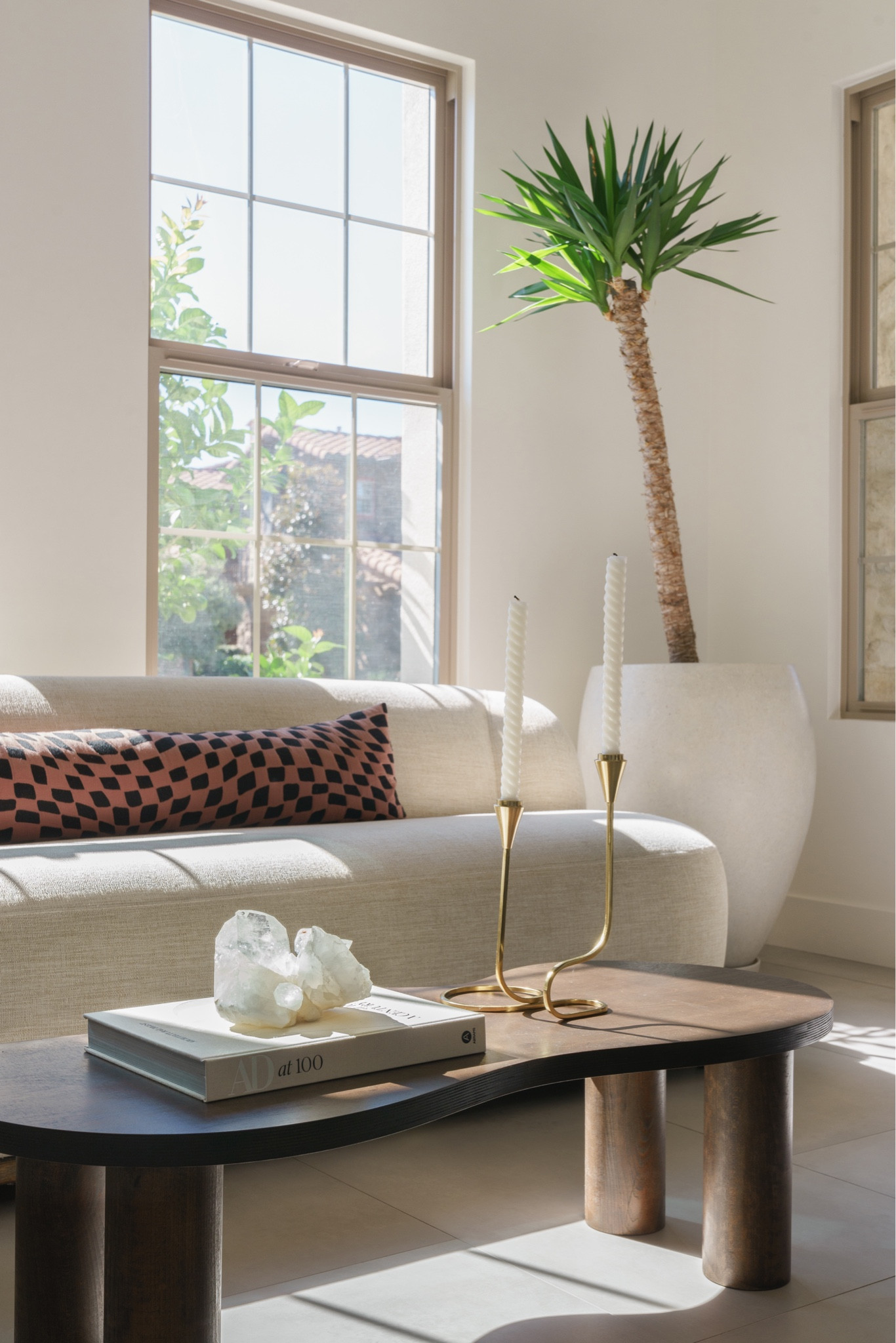 California modern living room 

Organic shaped coffee table | brass candlestick holder | brass | walnut | checkered pillow | architectural digest | McGee & co. 

#LTKFind #LTKhome #LTKunder100