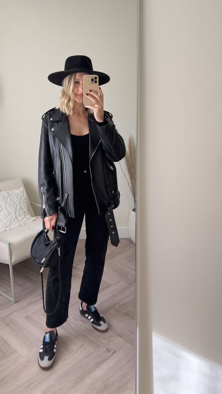 All black weekend outfit styling black jeans - oversize leather biker jacket and adidas sambas 👟🖤

Get 15% off my Ganni small black handbag and free next day delivery with code: CB15 at Coggles 

#blackoutfit #weekendoutfit #adidassamba #trainers #blackbag #jeans #blackjeans 

#LTKSeasonal #LTKeurope #LTKitbag
