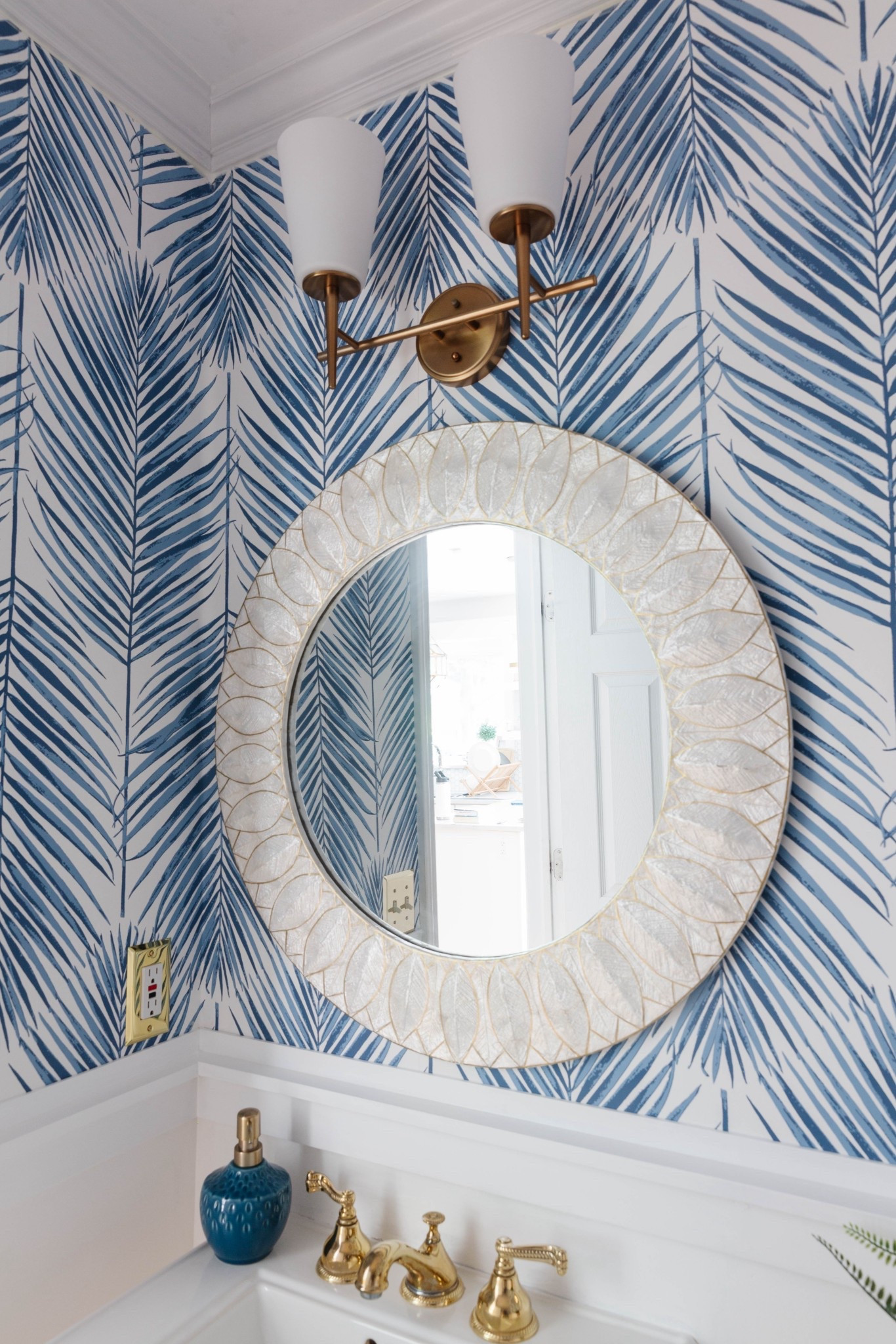 This coastal powder room with blue and white palm print wallpaper is one of my favorite small-space design moments. I love how the bold wallpaper paired with crisp white accents makes the room feel elevated, layered, and designer-inspired. 



#LTKHome #LTKU #LTKSaleAlert