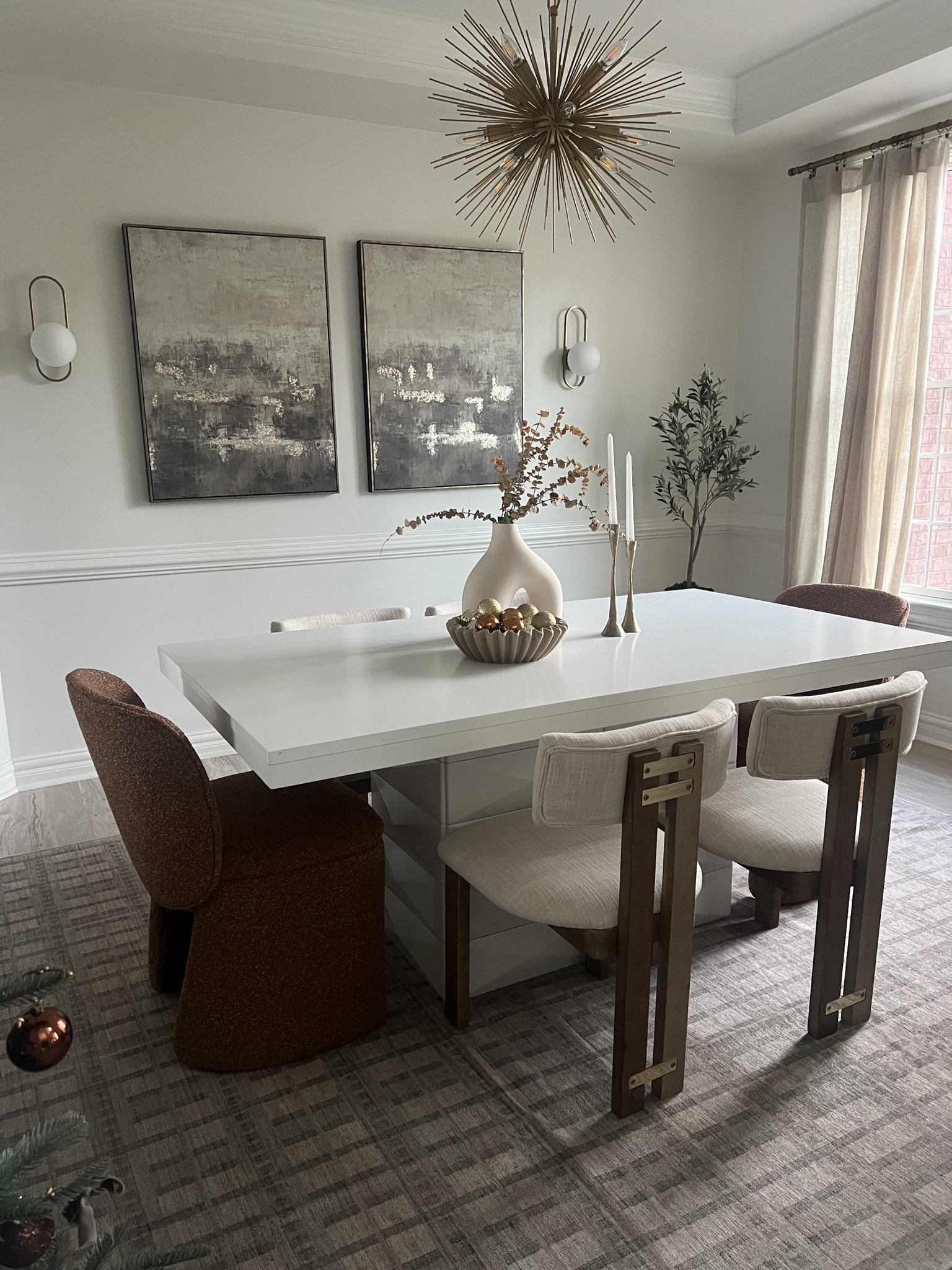 Made some updates to our dining room space to warm it up for season! Included a rug by Tumble in size 8x10 new linen chairs with light wood and gold accents and the most comfortable and unique end chairs in a camel color! My specific dining table is older so I could not tag. Exact chairs, sconces, light fixture and mirror all tagged  

#LTKfamily #LTKhome