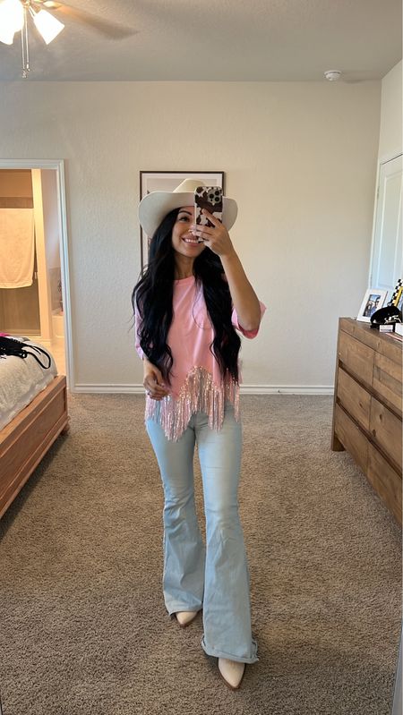 BARBIE INSPIRED WESTERN OUTFIT 🤠 | PART IV
Fringe top of my dreams from @shopwhiskeydarling. Paired with my favorite bell bottoms from @shopbuddylove. Use code HEYITSRUBEE15 to save. 

Follow my shop @heyitsrubee on the @shop.LTK app to shop this post and get my exclusive app-only content!
https://liketk.it/4eAw4

#barbie #hibarbie #hiken #barbiethemovie #barbiestyle #barbieoutfit #barbiedoll #barbiegirl #westernbarbie #cowgirlbarbie #concertoutfit #cowgirlboots #westernfashion #cowgirlchic country concert outfit | country concert ootd | morgan wallen concert outfit | cowgirl boots outfit | cowgirl style | cowgirl chic | western fashion inspo | western outfit | western style

#LTKunder50 #LTKSeasonal #LTKstyletip