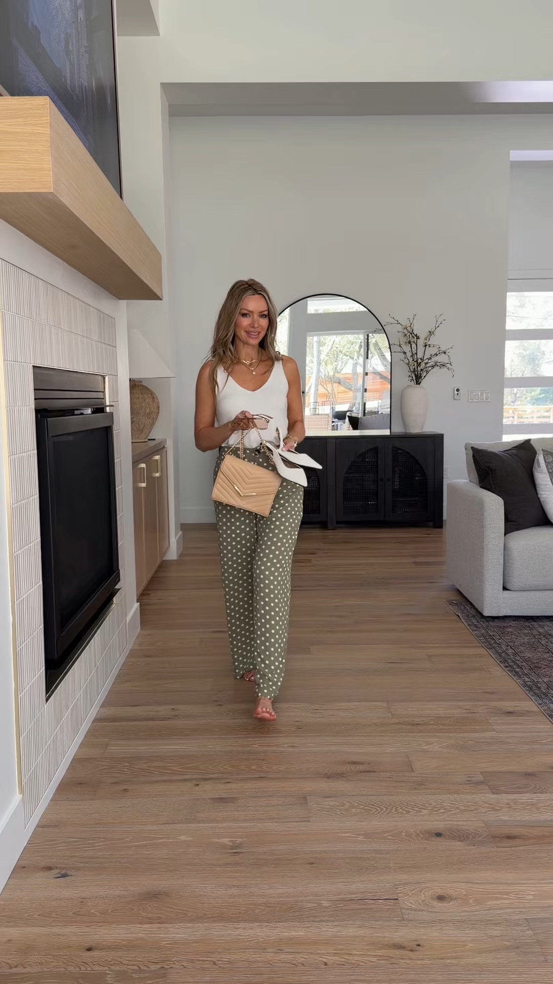  Amazon outfits I’m totally recommending this week and every single one has elevated basics + effortless mom style. Comment AMAZON and I’ll send you the details ❤️

• Olive polka dot wide leg trousers + soft neutral tank (so flattering and chic for everyday)
• Neutral scallop tank + cream wide leg pants (the ultimate capsule closet combo)
• White tank + flowy blue midi skirt (lightweight, feminine, perfect spring-to-summer outfit)
• Coral scallop tank + stretchy wide leg jeans (the easiest pop of color for warm weather)

These are the kind of affordable everyday outfits that look polished but feel comfortable enough for real life. Easy to mix and match, flattering fits, and that neutral chic vibe I’m always going for.



#AmazonFashionFinds #AffordableOutfitIdeas #NeutralChic #ElevatedBasics #MomStyle 