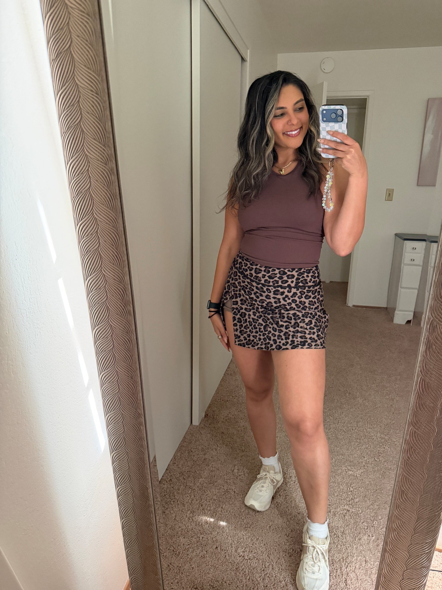 Skirt is from Abercrombie last season but linked similar. 

Brown top with built in bra and leopard print skort

Nike vomero 5s 