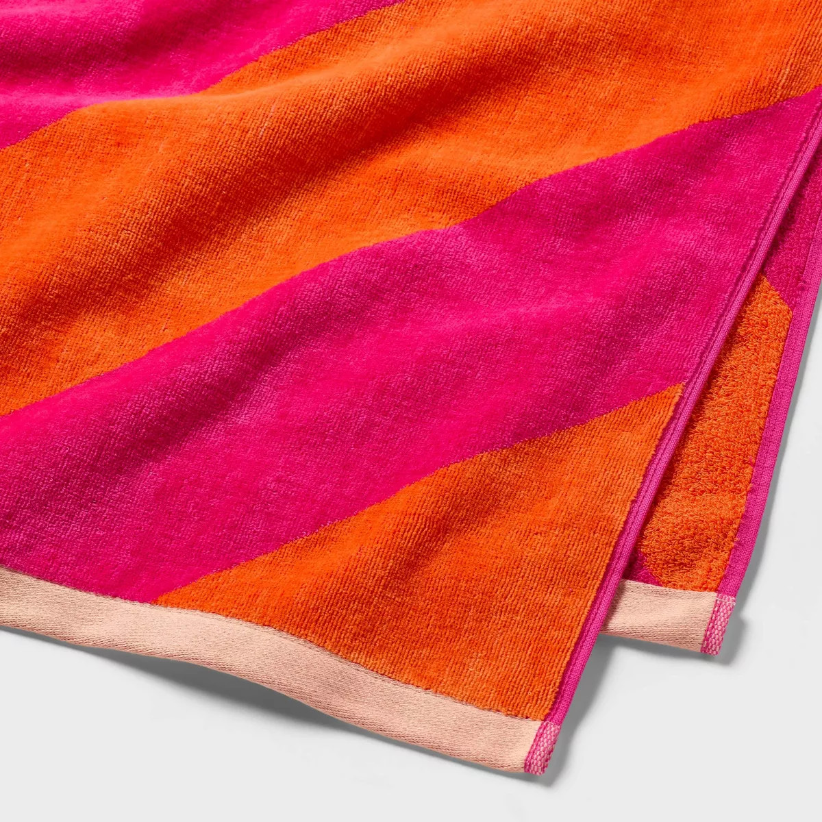 36"x72" Reversible Diagonal Striped Oversized Beach Towel Pink/Orange - Room Essentials\u2122 | Target
