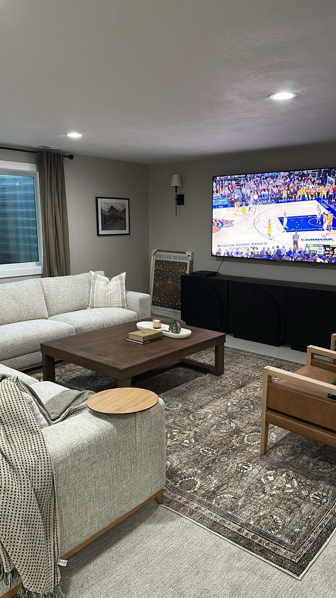 Basement living room
Coffee table
Sectional couch
Leather chairs
Coffee table decor


#LTKHome