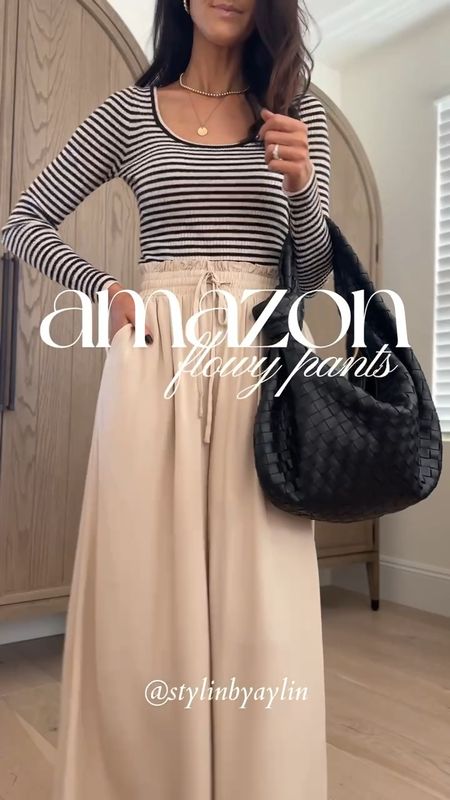 Amazon flowy pants that are so good! I'm just shy of 5-7" wearing the size small pants and long sleeve from target.
This is one of my favorite designer bags at the moment and I have used it every single day since I got it! xx

‼️ FYI I do NOT recommend getting the white pair, they are very see through and the lining is very visible. Had to return

#LTKSeasonal #LTKfindsunder100 #LTKstyletip