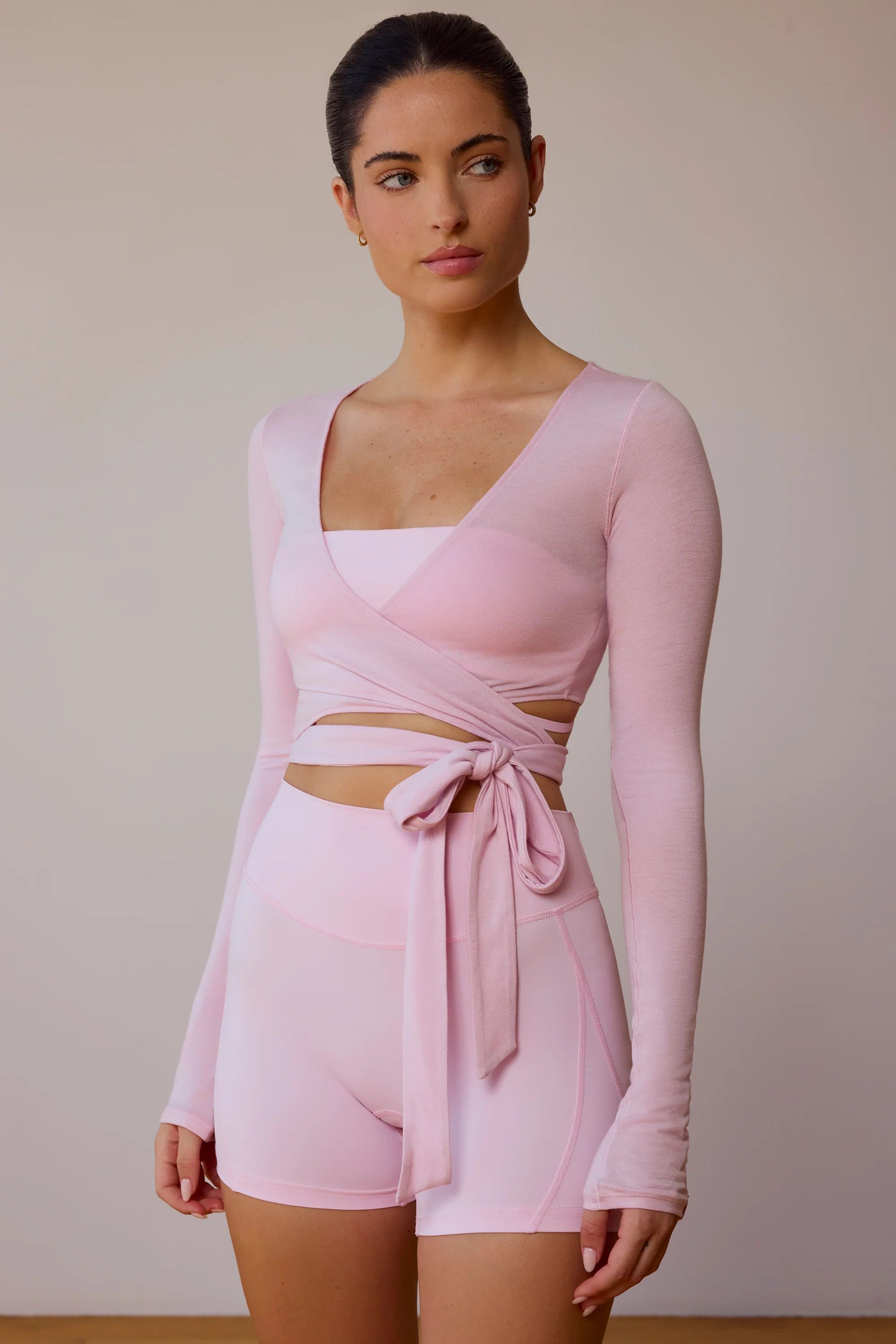 Long-Sleeve Wrap Crop Top in Soft Pink | Oh Polly