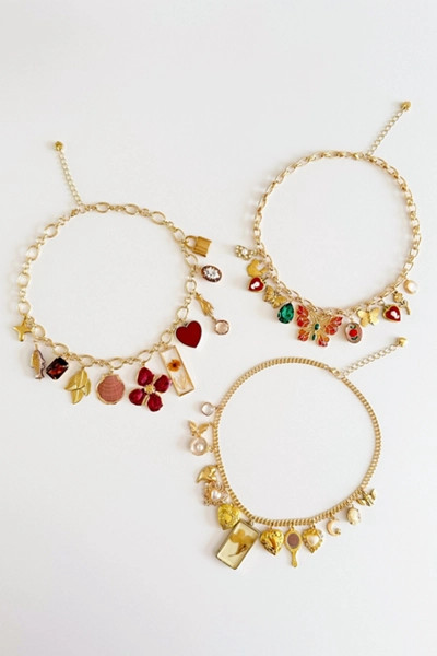 Shop Charming Tea Floral Charm Necklace | Urban Outfitters (US and RoW)