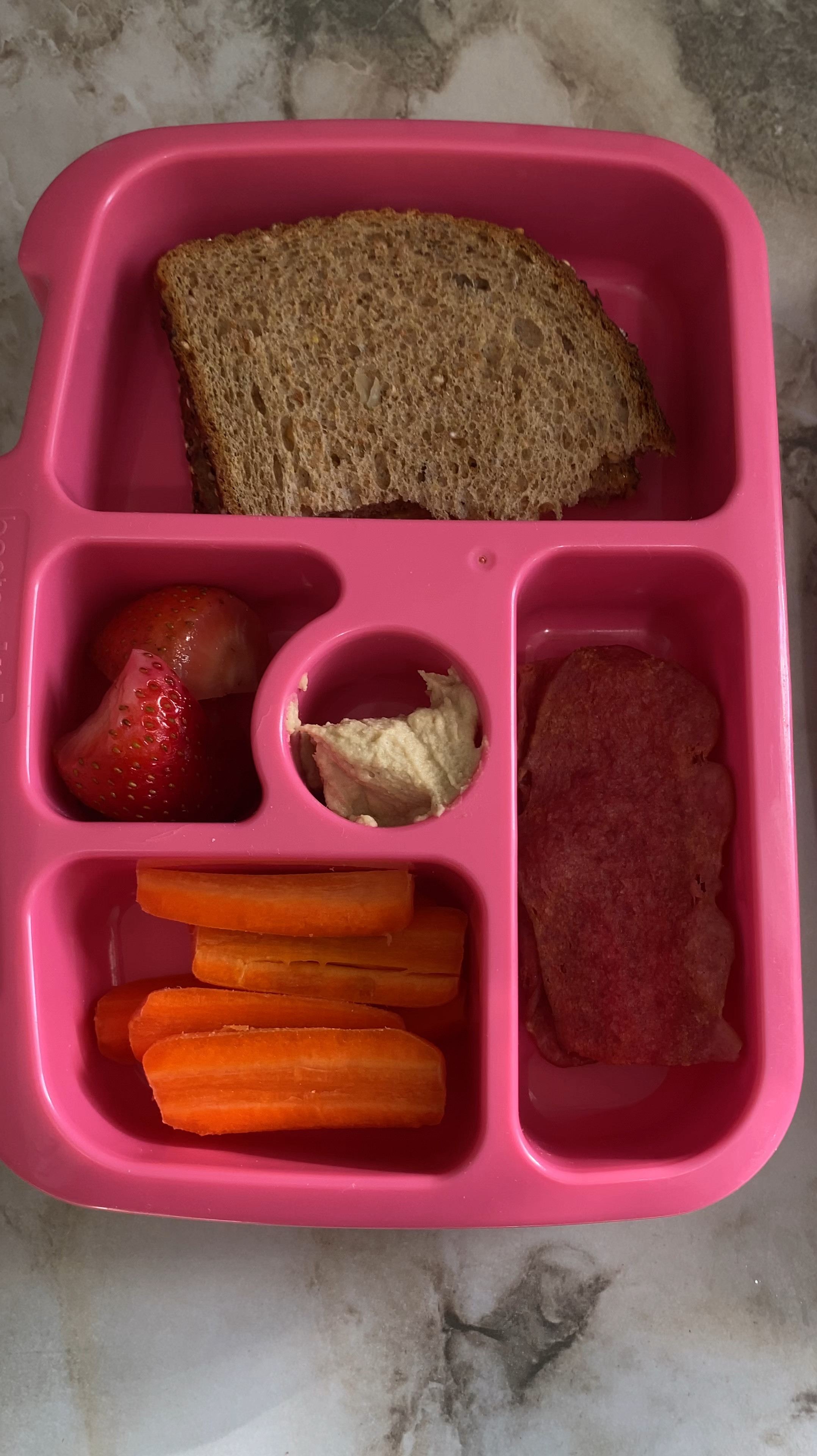 Girls Lunch for today was:
Multigrain toast with peanut butter and jelly, carrots with hummus, strawberries and turkey bacon. 
.
.
.
#wellbalancedmeal #proteinmeal #kidsmeal

#LTKGiftGuide #LTKFamily #LTKKids