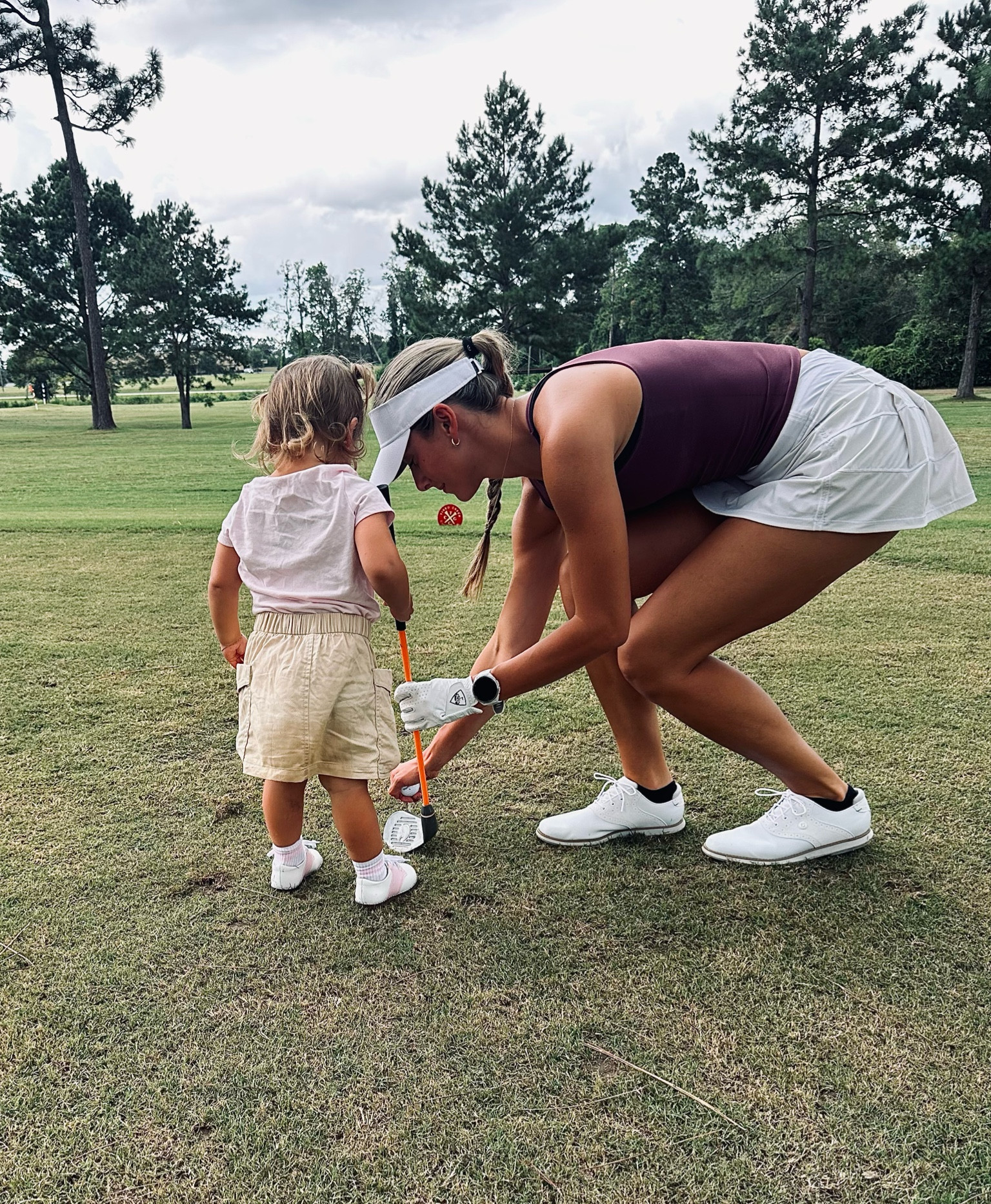 Golf with my girl 👏🏼

Toddler | toddler and mama | golf | golf fit | white golf short | white tennis skirt | white golf shoes | foot joy women’s golf shoes | kids golf shoes | toddler golf shoes 

#LTKKids #LTKFamily #LTKBeauty