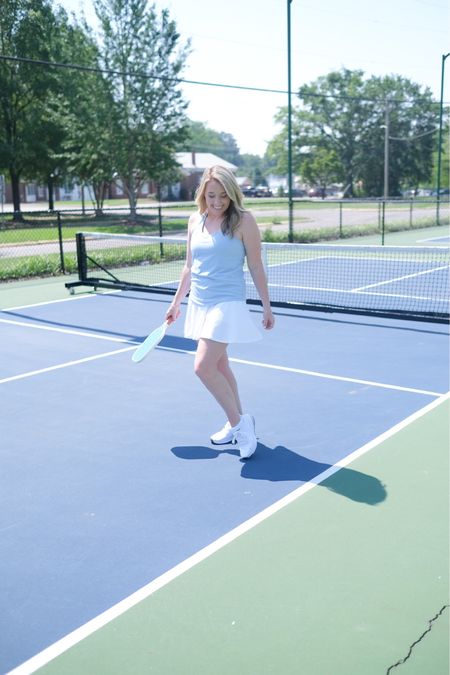 pickle ball wear

cute blue tank white skirt/skort athletic wear 

#LTKFind #LTKstyletip #LTKFitness