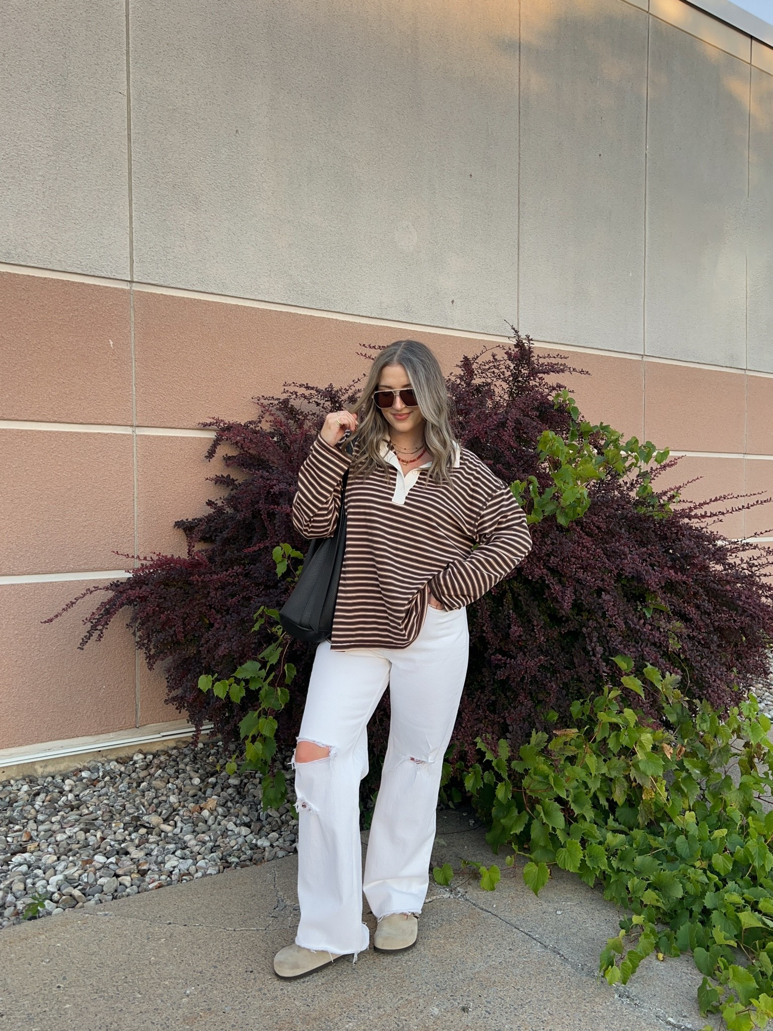 Casual fall outfit! Wearing L in the striped polo long sleeve top and 30 in the white jeans. I’m a 9.5-10 and wear a 40 in the Birkenstocks

#LTKfall #LTKsale #LTKjeans