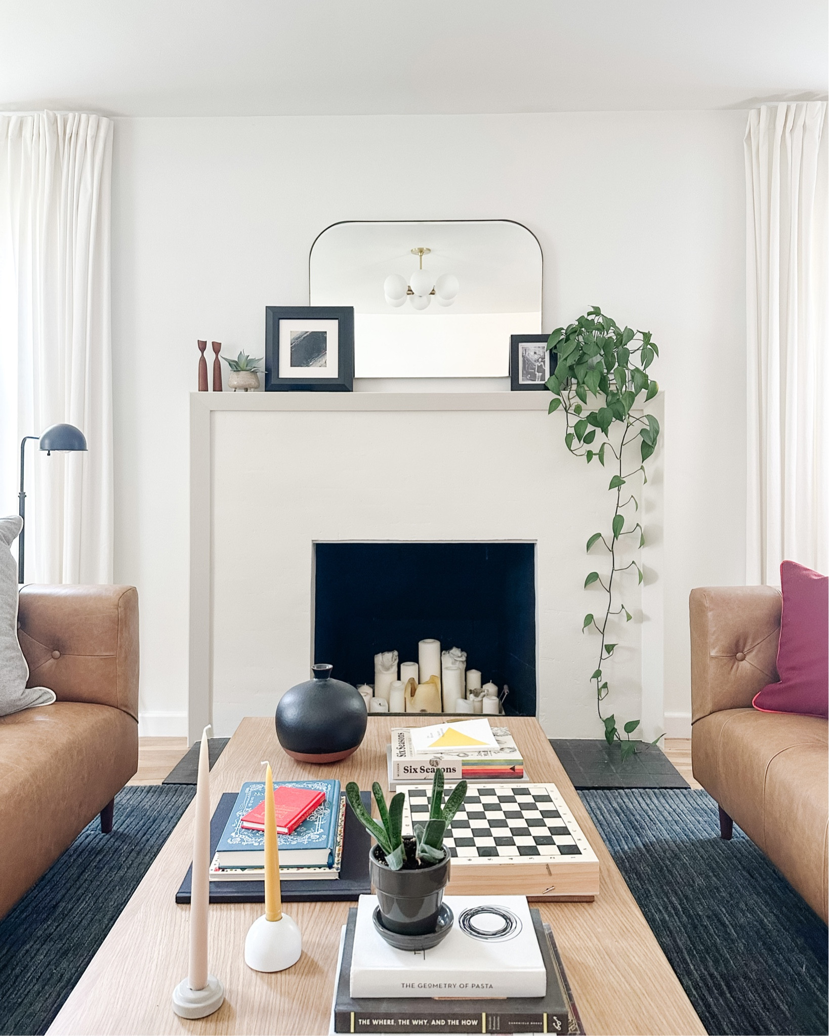 Brass mirror, area rug, throw pillow, candlestick, candlestick holders, board games, checkers, books, decor, coffee table books, art, lighting, lamp, floor lamp, coffee table

#LTKunder50 #LTKhome #LTKstyletip