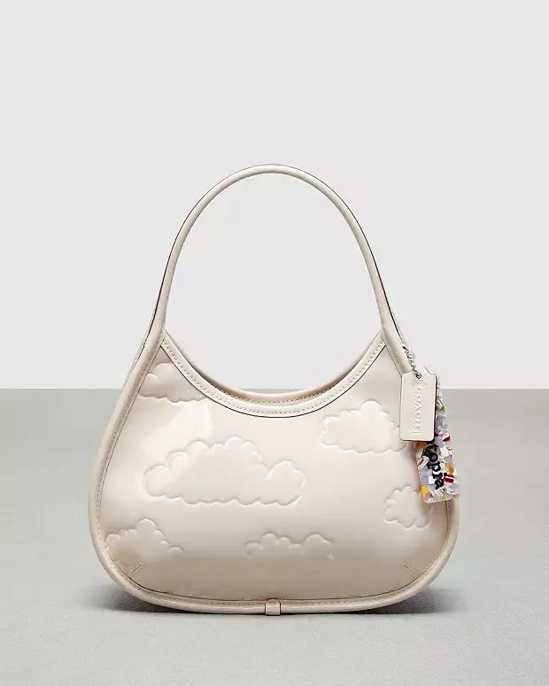 Ergo In Crinkled Patent Leather: Embossed Cloud Print | Coach (US)