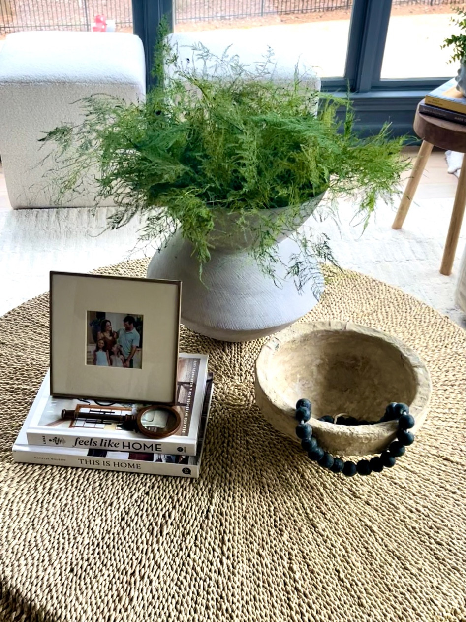 Coffee table styling, coffee table how to, round coffee table vignette, coffee table decor items, vases, bowls, coffee table books

#LTKhome #LTKSeasonal #LTKstyletip