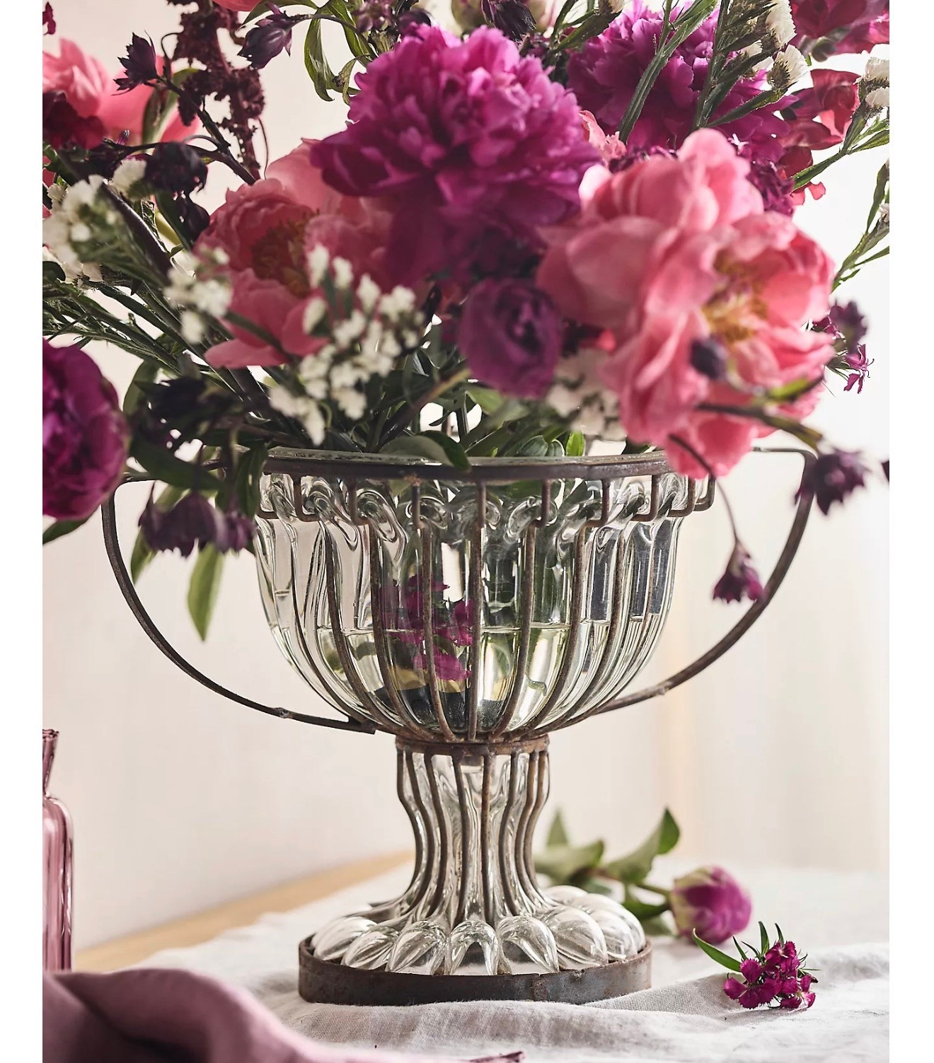 Glass + Iron Urn Bowl

Simple iron handles complete the classical silhouette of this handmade glass vessel

#LTKSeasonal #LTKHome