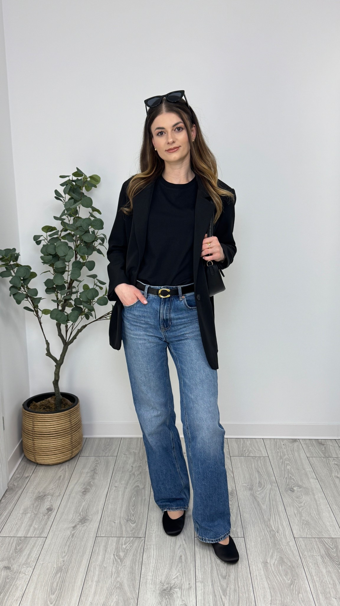 Blue wide-leg jeans, black t-shirt, black blazer, black ballerina flats, black belt, black purse, and sunglasses. A laid-back yet polished combo for everyday wear 🦋 #IlaStylesDiary

#LTKworkwear #LTKeurope #LTKspring