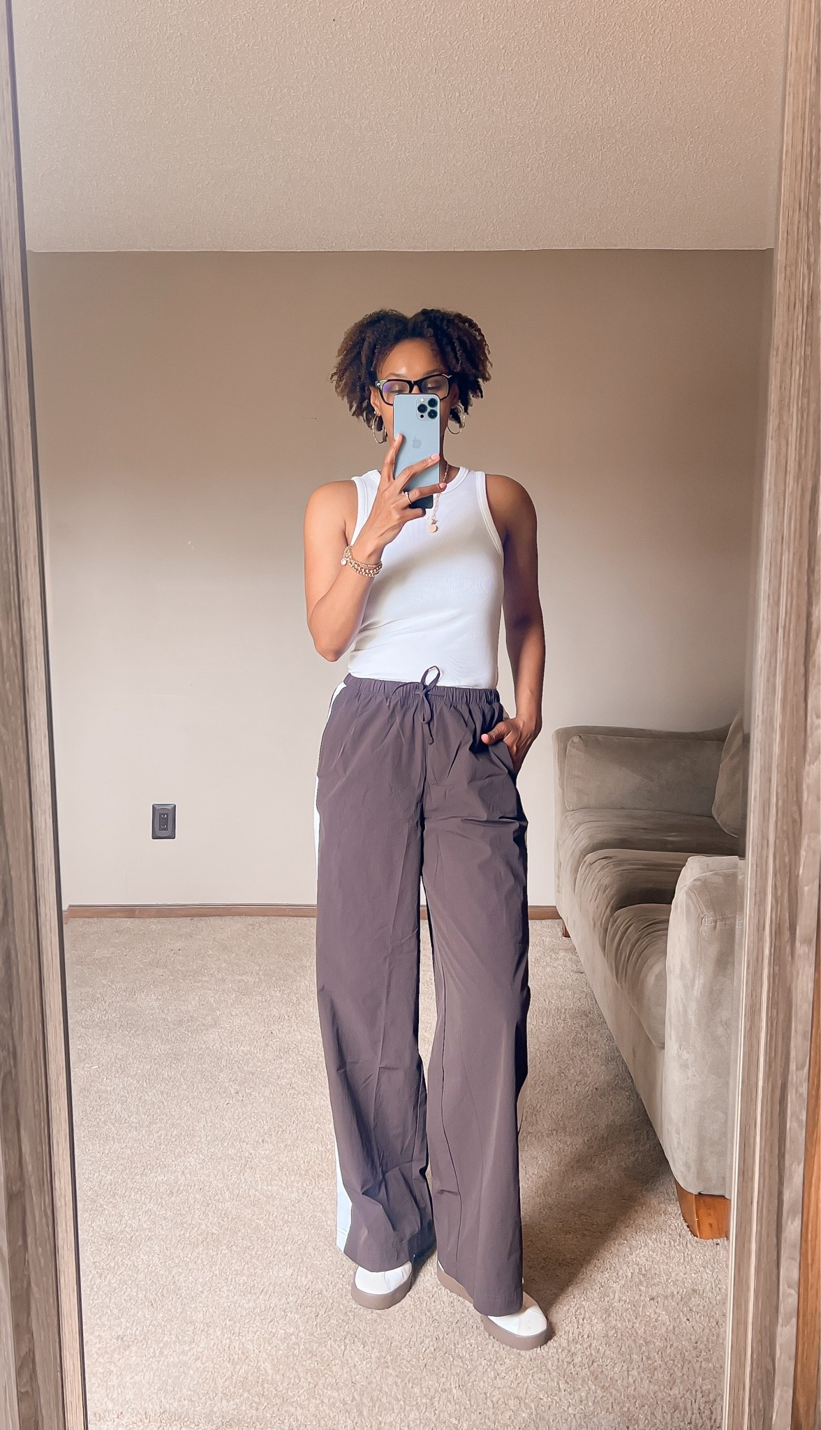 Lightweight windbreaker style pants that work nicely in my current temperatures. They had tall length!Added a high-tank and sneakers.

#LTKootd #LTKOver40 #LTKTall