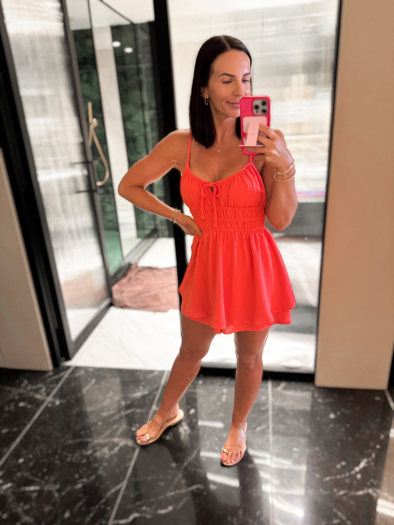 This romper is the moment. 🔥🍓

Easy, breezy, and bright — this coral cutie is giving major vacay energy. Lightweight, adjustable straps, and smocked in all the right places for a flattering fit. Perfect for tossing over a swimsuit or dressing up with wedges and a glow ✨

Wearing size small— comes in other colors too!
Linked my exact sandals too  

#LTKSummerEdit #LTKFindsUnder50 #LTKStyleTip