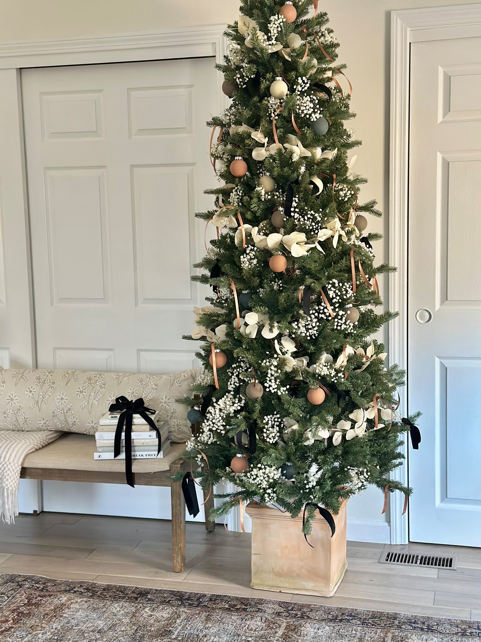 Moody Christmas tree in Terra cotta, taupe, black and cream colors  

#LTKHome #LTKSeasonal #LTKHoliday