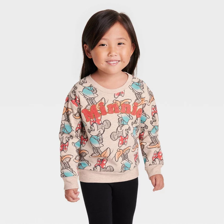 Toddler Girls' Disney Minnie Mouse Solid Pullover Sweatshirt - Beige | Target