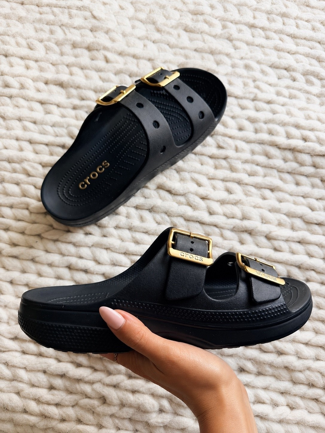 I wasn’t expecting to love these as much as I do. They have the comfort of classic Crocs but with the cutest gold buckle detail that makes them look like so much more. I’ve been wearing them for everything from running errands to pool + lake days because they’re lightweight, waterproof, ridiculously comfortable & actually cute. Such a good everyday summer sandal. TTS. 

Crocs buckle sandals - black sandals - comfortable sandals - waterproof sandals - everyday sandals - summer sandals - vacation shoes - beach sandals - pool shoes - travel essentials - comfy slides - casual outfits - mom style - neutral sandals - walking sandals - resort wear - summer wardrobe - lightweight sandals - gold buckle sandals

#LTKActive #LTKSwim #LTKdayinmylife
