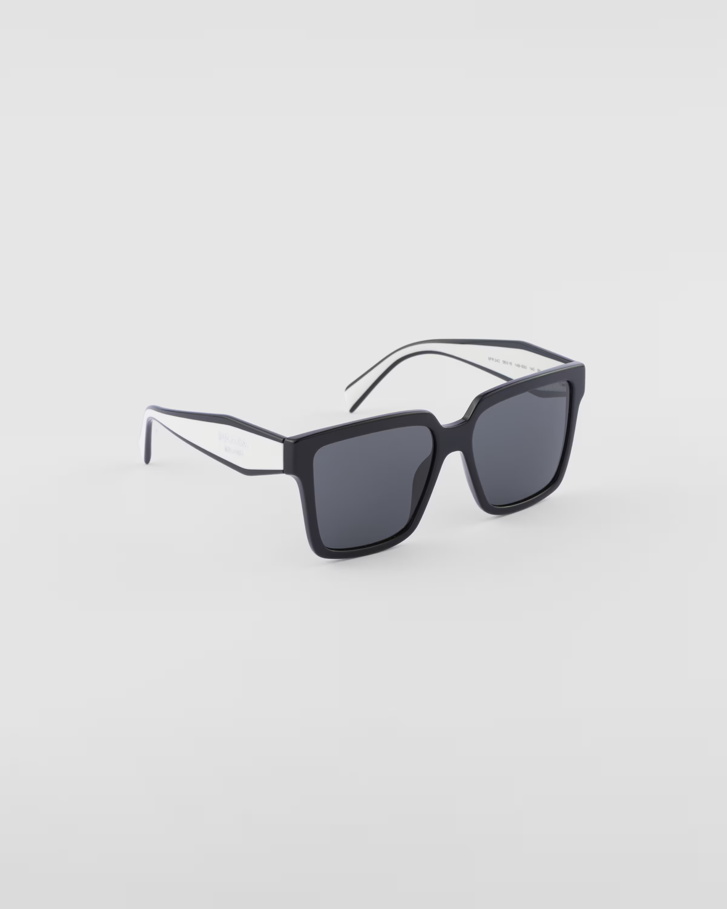 Sunglasses with Prada logo | Prada US