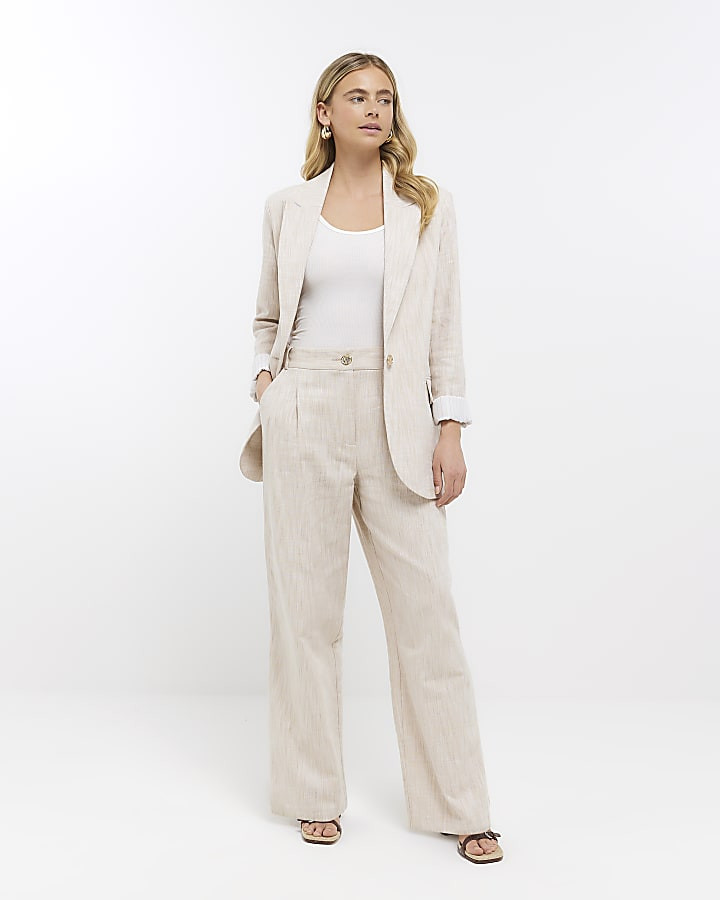 Beige pleated wide leg trousers | River Island (UK & IE)
