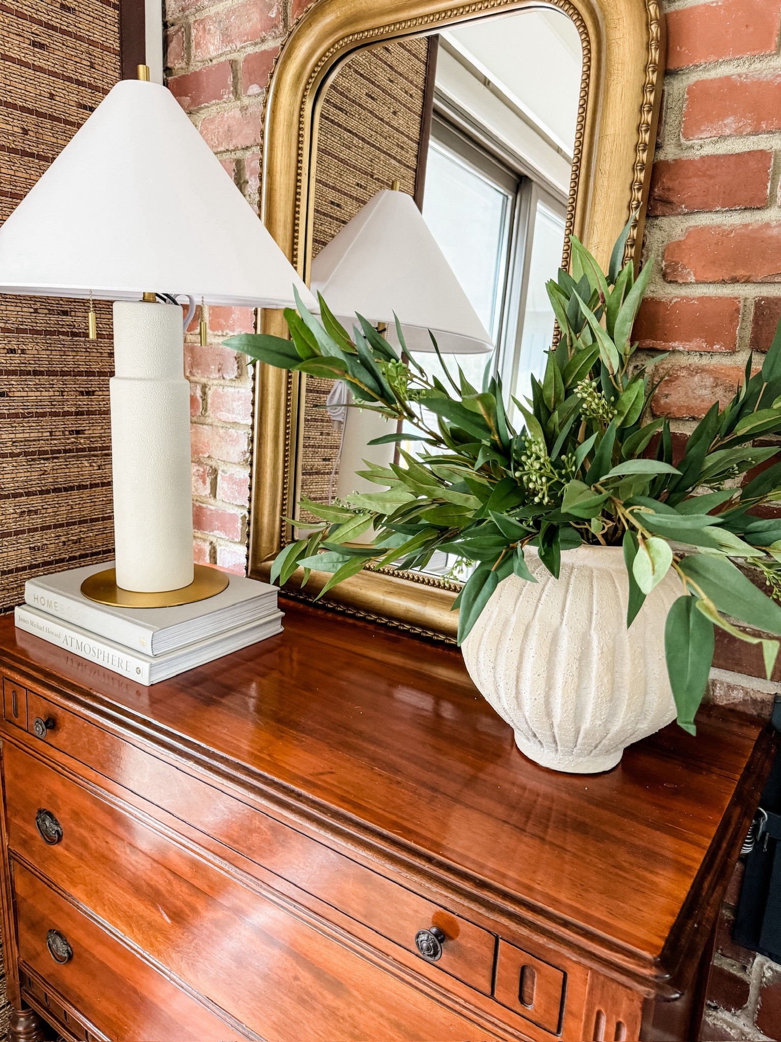 Home decor finds from Amazon and Target! Love this new lamp and vase that I just picked out at my local store. Online now! I love how budget friendly Target is when wanting to do a little home refresh. 

Target home, home decor, target finds, ceramic vase, carved flower vase, flower pot, faux stems, artificial branches, willow leaf stems, home refresh, living room, den space, living area, Amazon home, home decor, Amazon finds, Amazon must haves, Amazon interiors, dresser styling, affordable home decor, gold mirror, wooden dresser, coffee table book