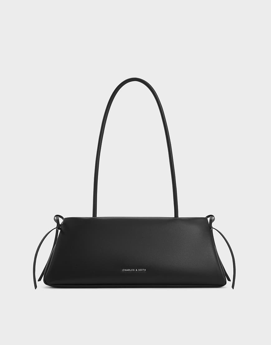 Charles & Keith Hazel bow elongated trapeze shoulder bag in noir-Black | ASOS (Global)