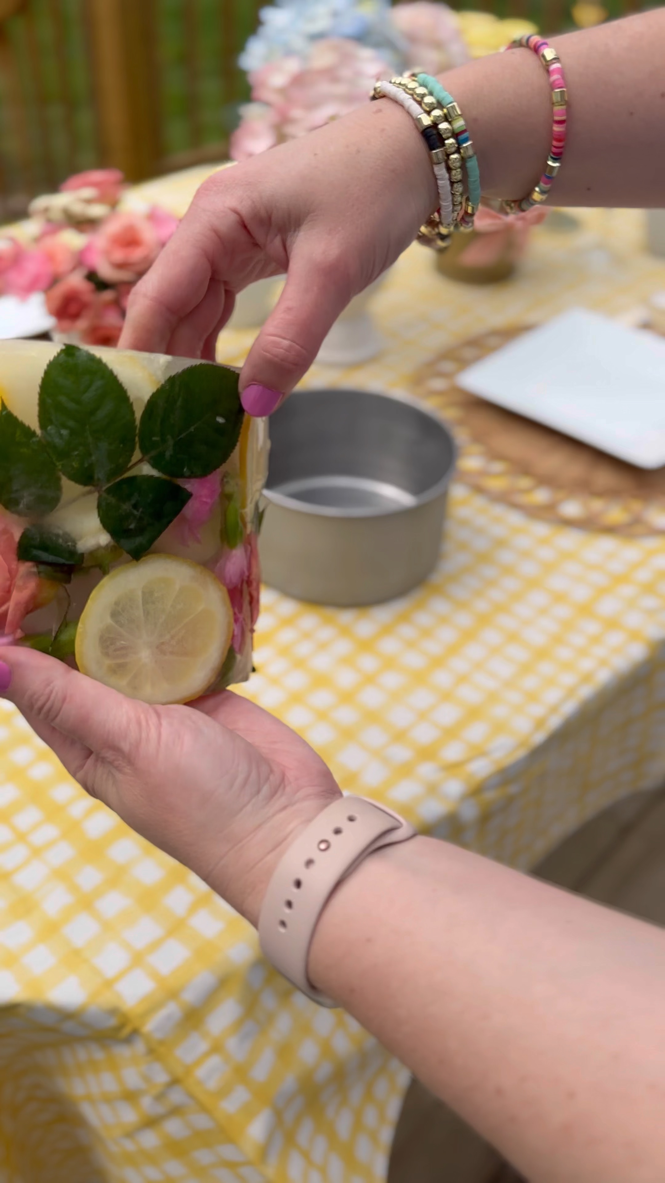 Wine bottle ice mold- add flowers, fruit and greenery and fill all the way up.
Freeze over night and you have a gorgeous centerpiece for wine chilling or even just any glass bottle 