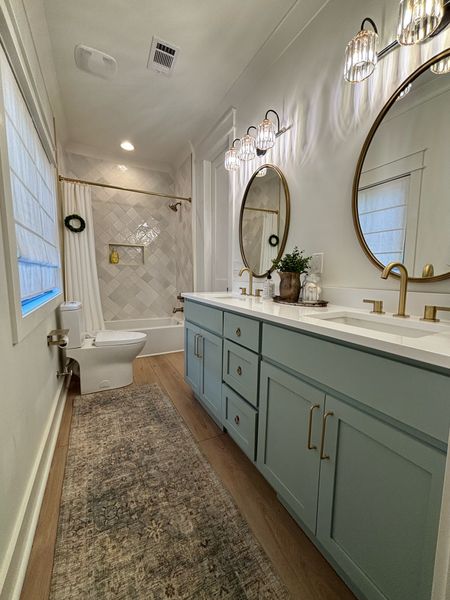 Im a firm believer that your house should be designed for the family in it. One design feature that I knew I wanted for my girls’ bathroom was to give them an extra built in boost while washing their hands or brushing their teeth. It’s one of Millie’s favorite things to show off in her “home tour.” When deciding between a prefab and custom, the little extra was worth it for the functionality of the space. #customvanity #customcabinetry #hiddenstepstool #functionality #customhome #dreamhome #interiordesign #buildtobuilt 