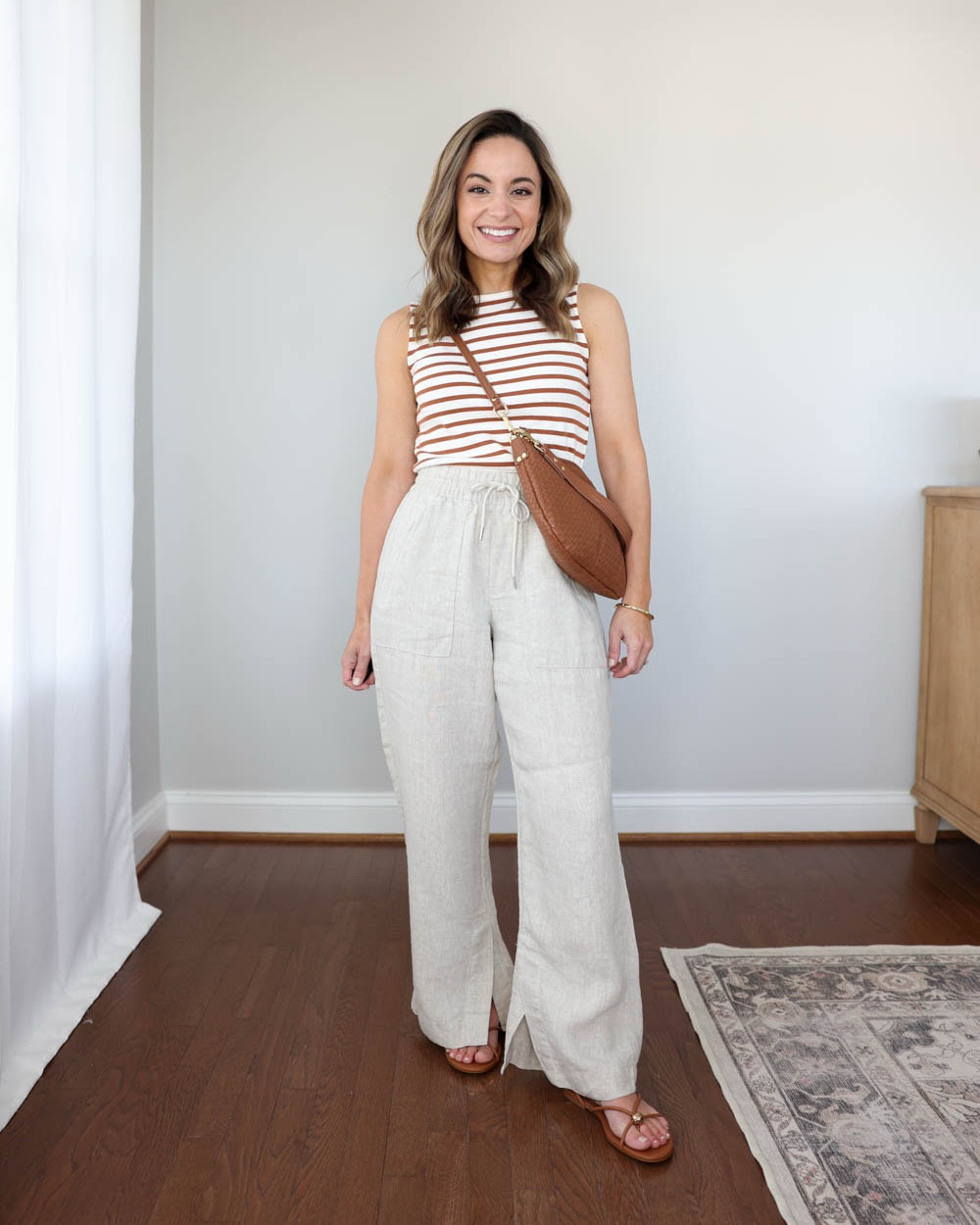 Petite-friendly sleeveless tank tops great for layering!

Outfit 1:
Tank top (J.Crew Factory): xxs
Linen pants (Athleta): petite xxs - 28” inseam 
Dolce Vita sandals: true to size, snug across toes and requires break in 

Outfit 2:
Breezy Tank Top (Athleta): XXS in navy 
Endless Pants (Athleta): Petite 0 
Sneakers (Gola): tts

Outfit 3:
Bella Straight jeans (Quince): 24 x 26" in Midnight Blue (shrank 1/2")
Tank Top (J.Crew Factory): XXS
Flats (J.Crew Factory): True to Size

My Sizing: I’m 4’10”, and my bust, waist, and hip measurements are 32″, 24″, and 36″. My ankle inseam is 25". 

#LTKSeasonal #LTKPetite #LTKootd