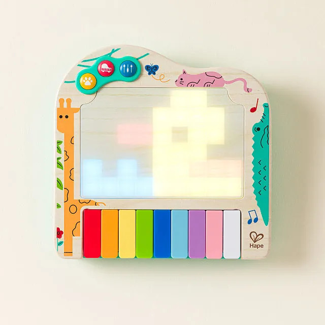 Light-Up Animated Pixel Piano | UncommonGoods