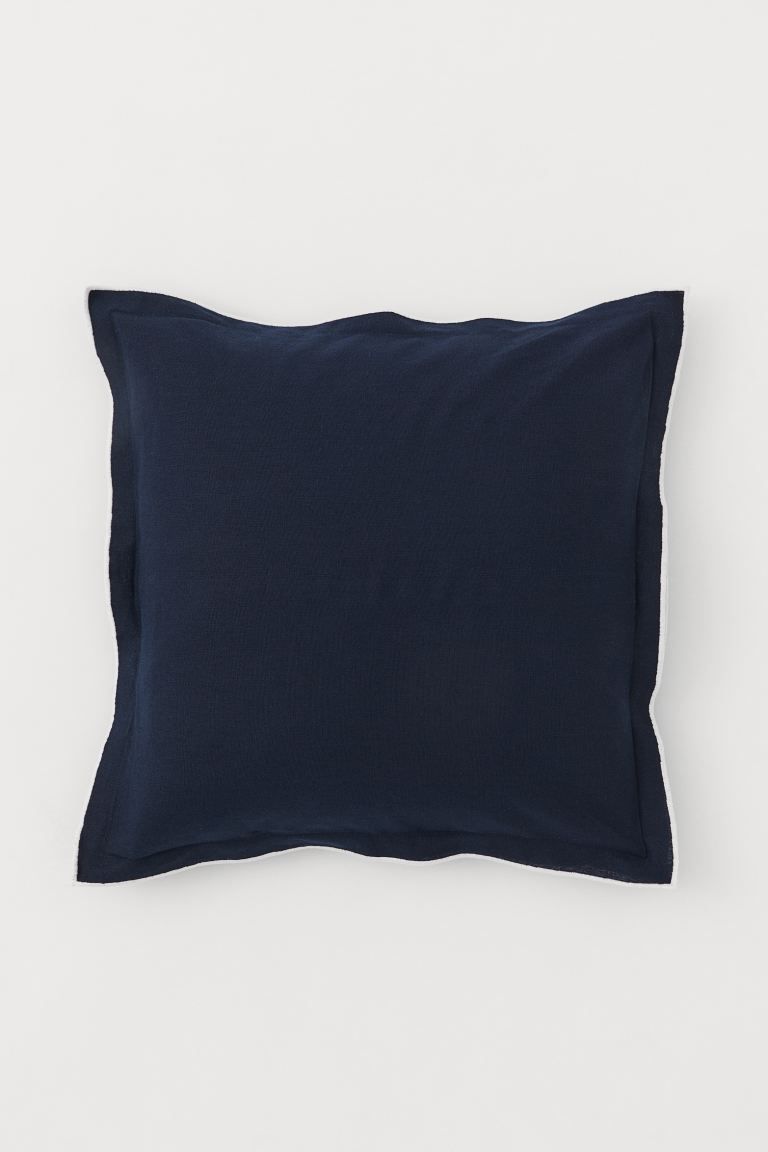 Cushion cover in a linen and cotton weave with contrasting colour seams around the edges and a co... | H&M (UK, MY, IN, SG, PH, TW, HK)