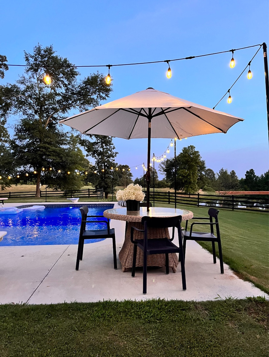 Pool patio furniture and decor! 
Outdoor string lights
Umbrella 

#LTKstyletip #LTKhome #LTKswim