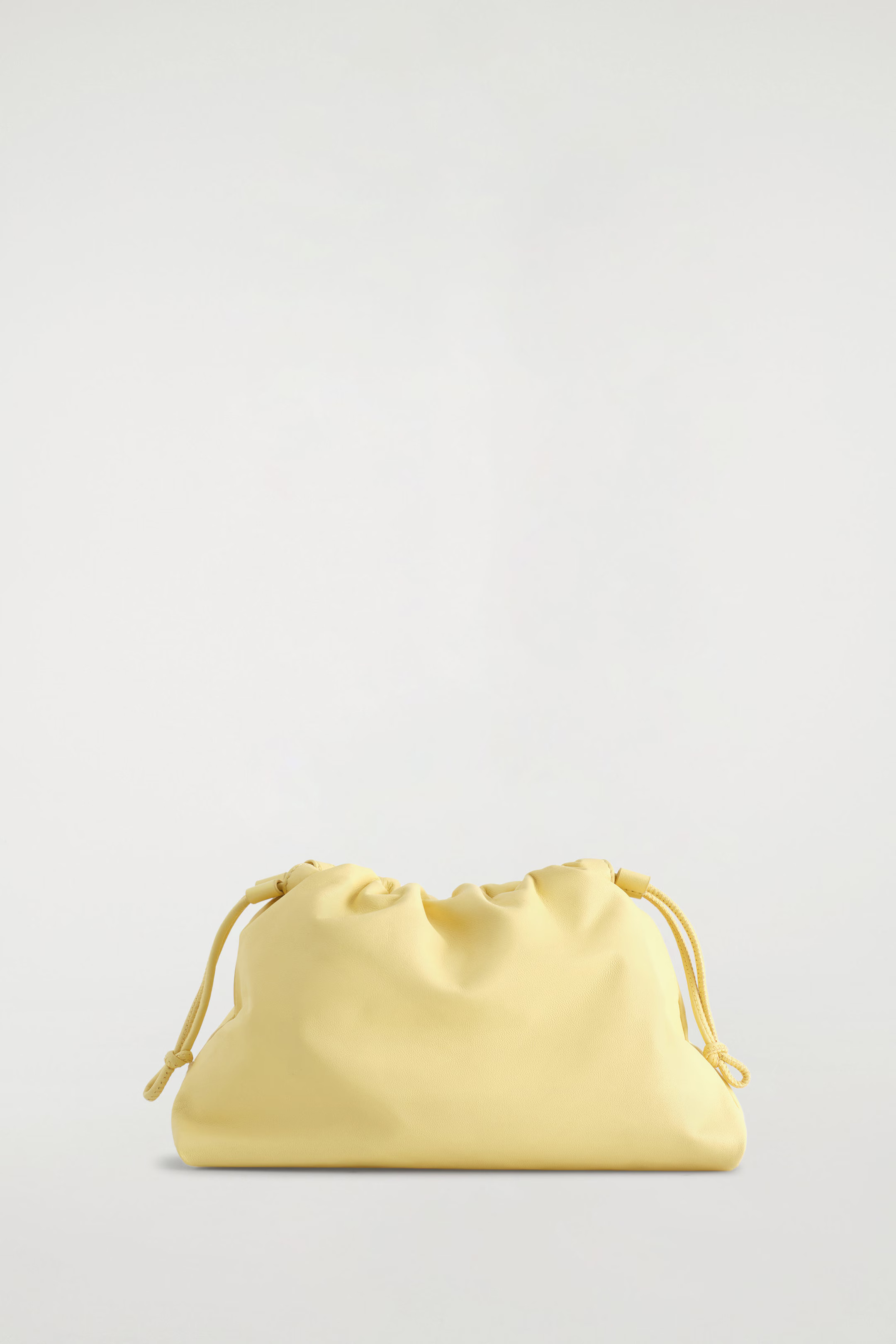MINI CAVATELLI CLUTCH BAG - LEATHER - BUTTER YELLOW | COS | COS UK