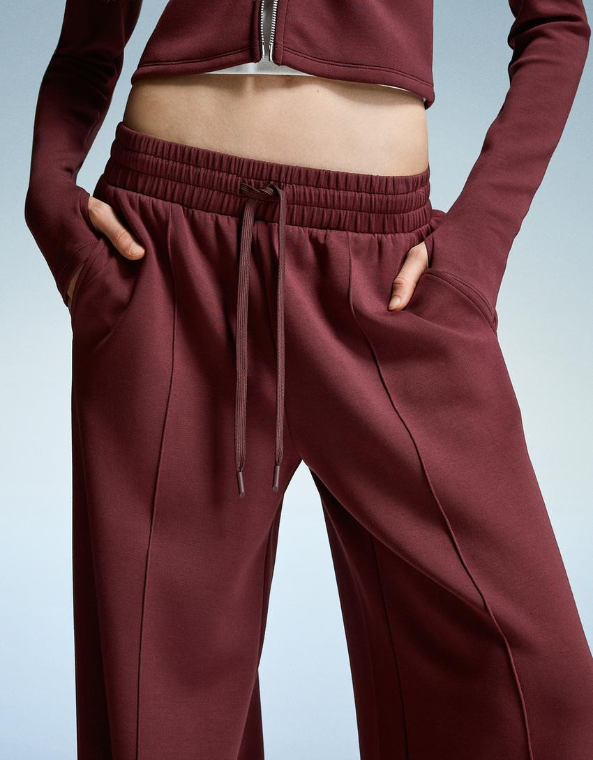 Soft touch wide-leg trousers - Trousers - Women | Bershka GB