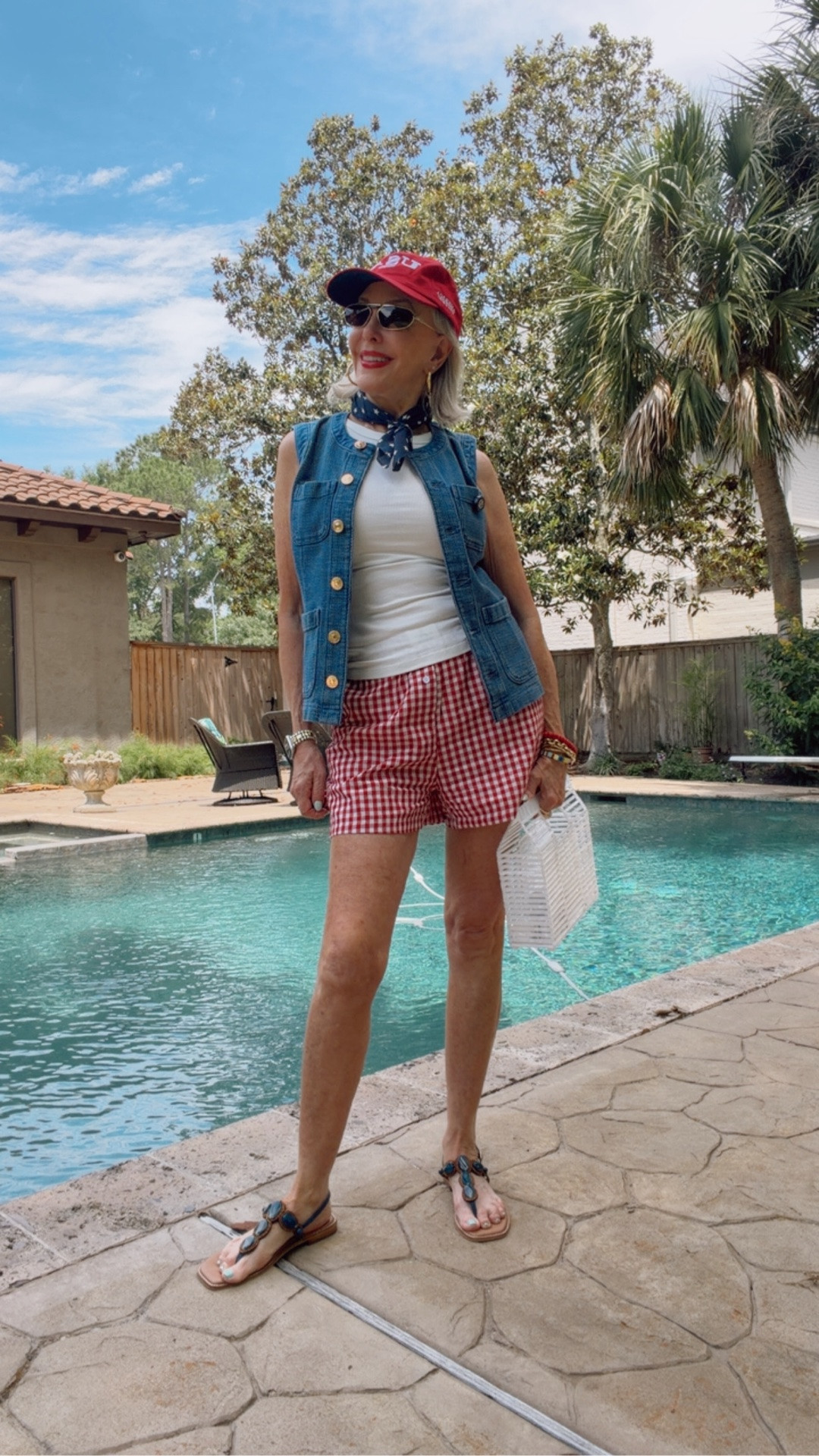 Gingham shorts and ribbed knit tank 
Wear as pj’s or a patriotic outing. I love bringing in the denim aspect. Denim vest is on sale at Chico’s. I am 5’7” 132 lbs and I wear a size 0 in Chico’s unique sizing. 
White Lucite bag,

#LTKOver40 #LTKSaleAlert #LTKgrwm