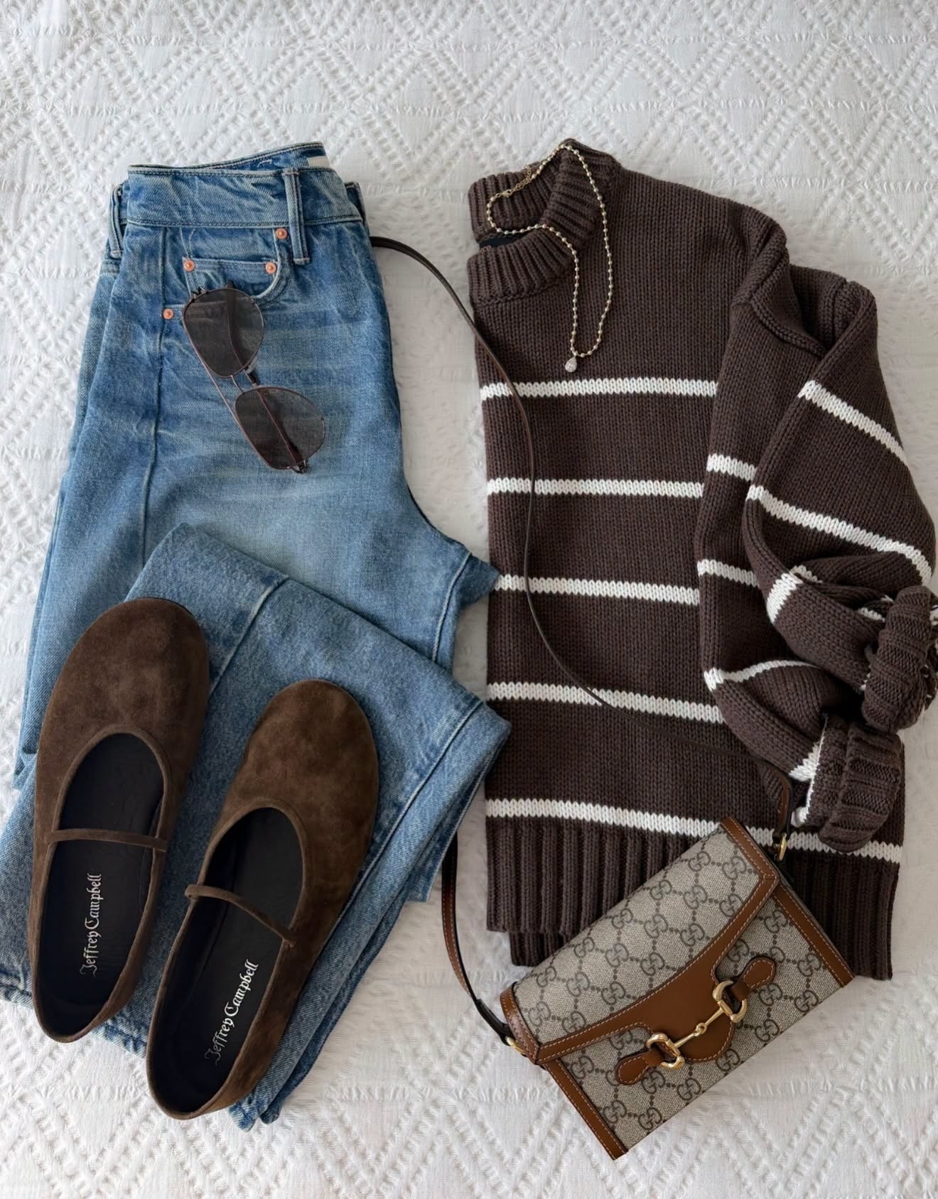 This is exactly how I want to dress for early fall. A chocolate brown striped sweater with classic denim and suede Mary Janes gives you all the fall color without needing a full layered look yet.

brown striped sweater, early fall outfit, fall outfit idea, straight leg jeans, suede Mary Janes, brown flats, transitional outfit, casual fall style, fall accessories, everyday outfit, annabrstyle

#LTKootd #LTKgrwm #LTKSeasonal