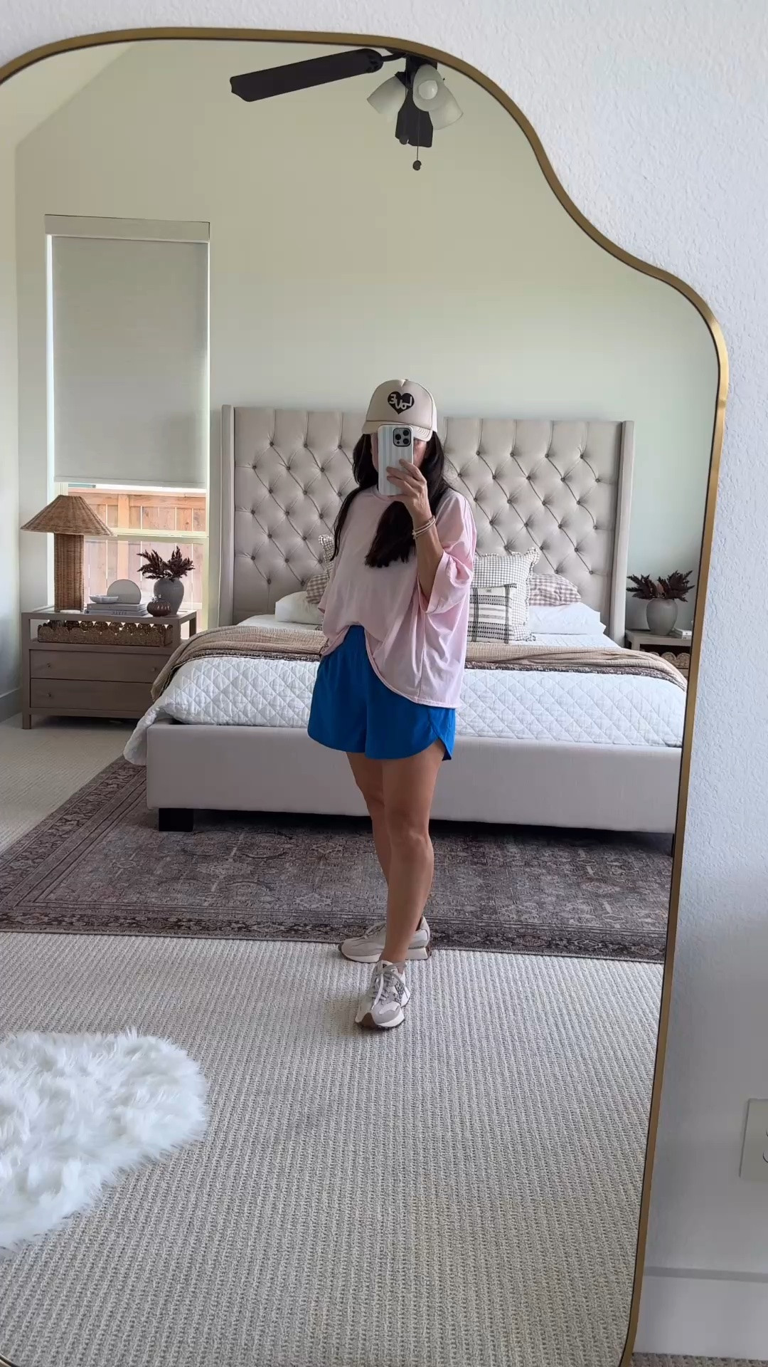 An easy casual athleisure outfit I’ll wear on repeat for school drop off, coffee runs, errands and busy everyday days. The oversized pink tee + bright blue athletic shorts are such a fun color combo, and I love adding the lightweight pink jacket when I want an extra layer. Finished it with neutral sneakers and a baseball cap for an easy everyday outfit that still feels put together. Summer to fall transition outfit. Save and follow for more inspiration. 

Shop my casual outfit, athletic shorts, oversized tee, lightweight jacket, sneakers + hat here.

#LTKootd #LTKActive #LTKvlog